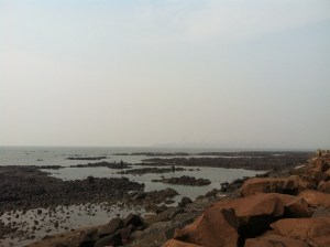 The beach at TIFR, looking north to the haze-obscured skyline of Mumbai